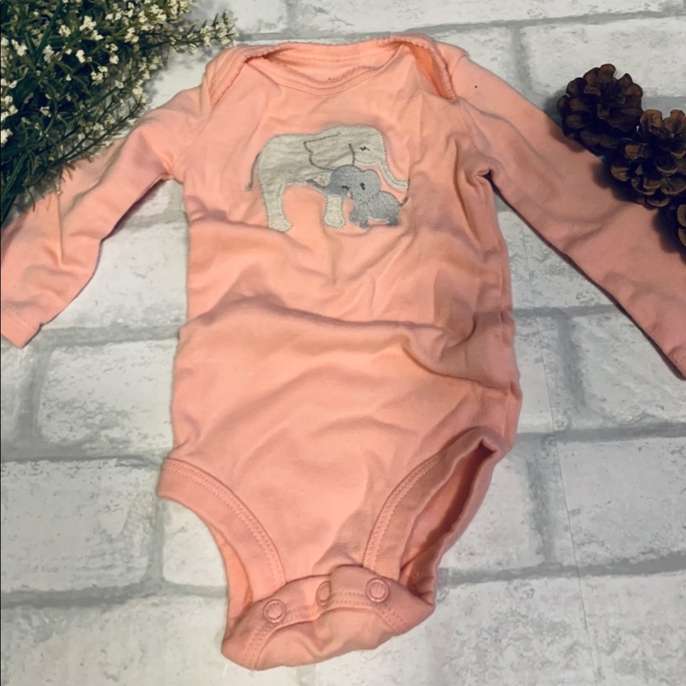 Pink and gray onesie.